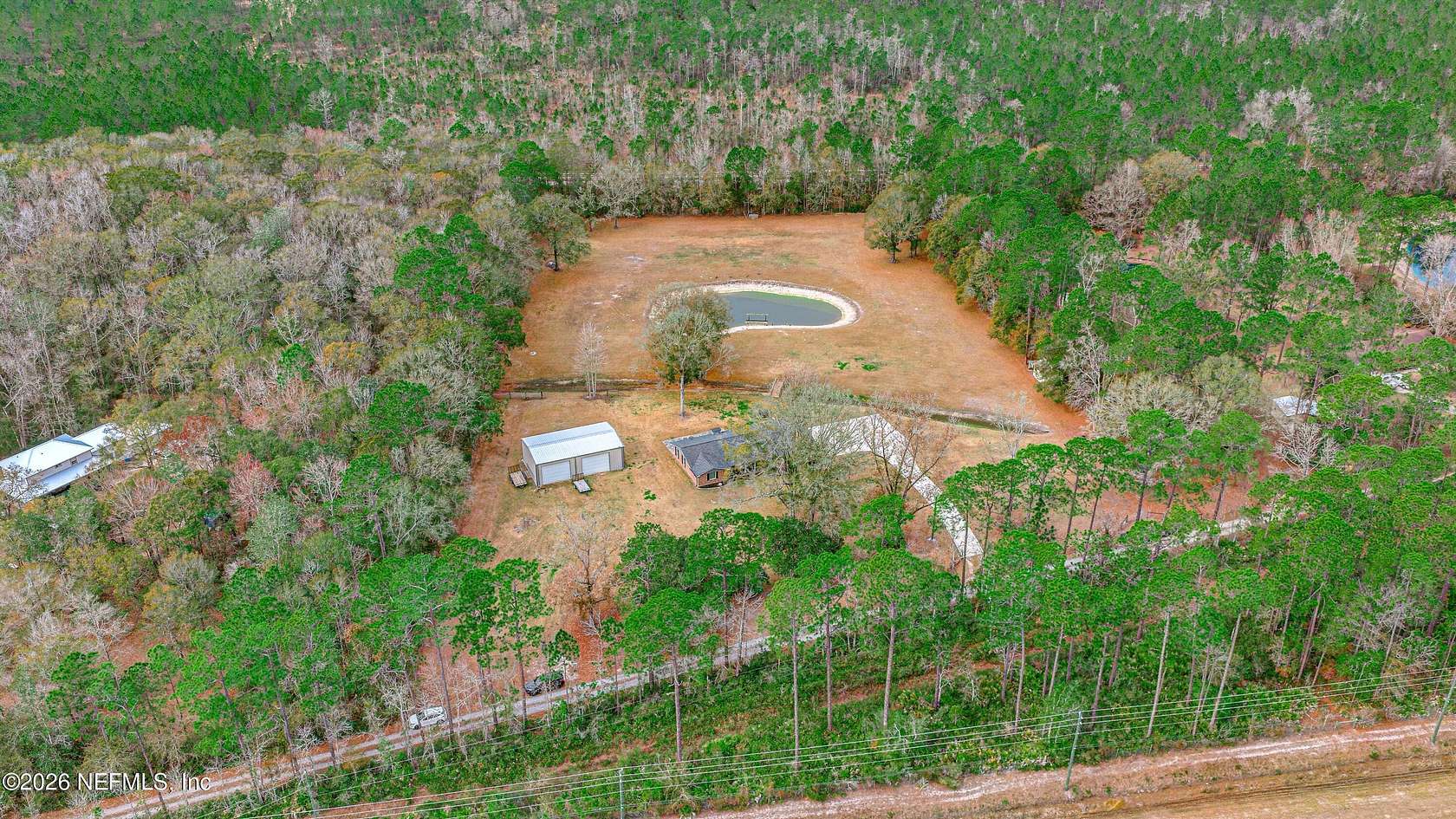 5 Acres of Residential Land with Home for Sale in Bryceville, Florida