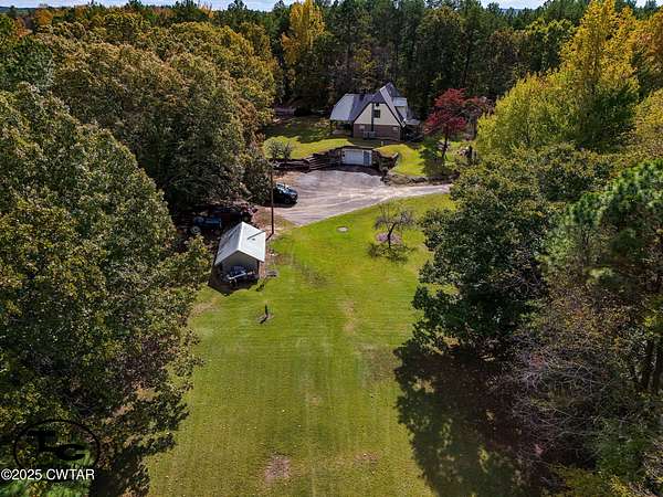 68 Acres of Land with Home for Sale in Finger, Tennessee