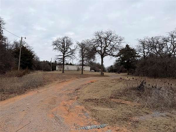 5 Acres of Residential Land with Home for Sale in Minco, Oklahoma