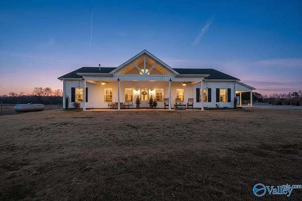 10.6 Acres of Land with Home for Sale in Hazel Green, Alabama