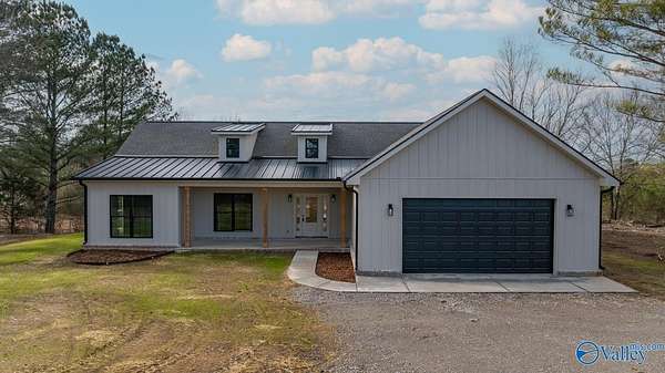 1.52 Acres of Residential Land with Home for Sale in Laceys Spring, Alabama