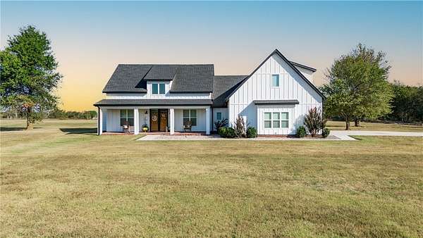 3.7 Acres of Land with Home for Sale in Gravette, Arkansas