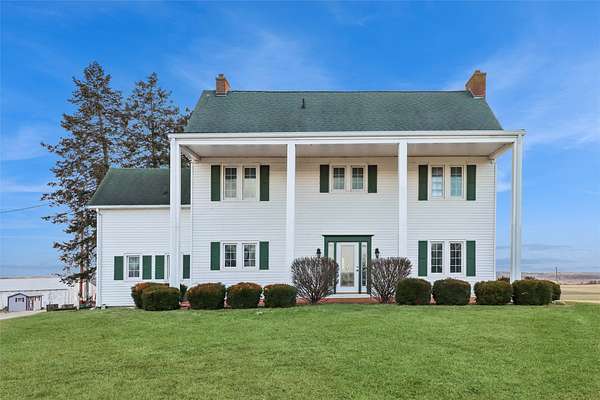 18.7 Acres of Land with Home for Sale in Carlisle, Iowa