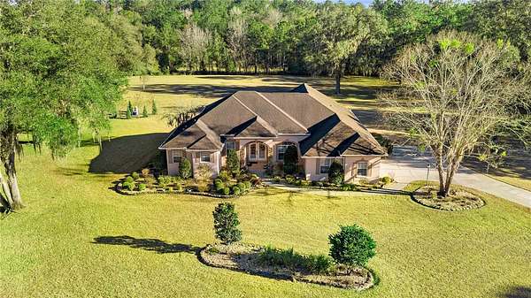 3.7 Acres of Residential Land with Home for Sale in Williston, Florida