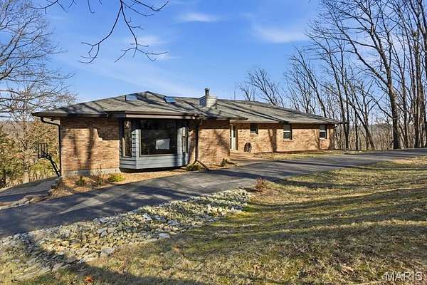 9.16 Acres of Residential Land with Home for Sale in Meramec Township, Missouri