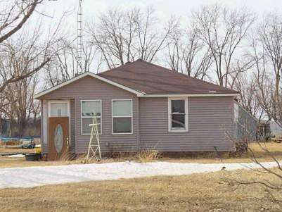 5.6 Acres of Residential Land with Home for Auction in Comfrey, Minnesota