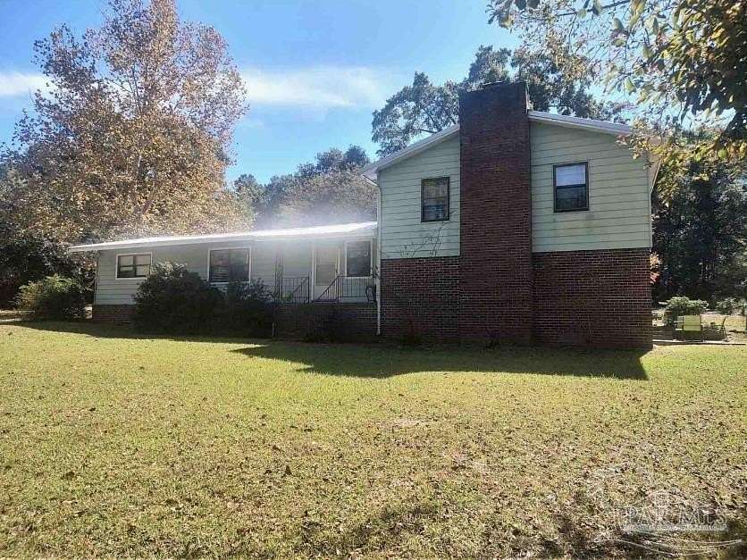 2 Acres of Residential Land with Home for Sale in Century, Florida