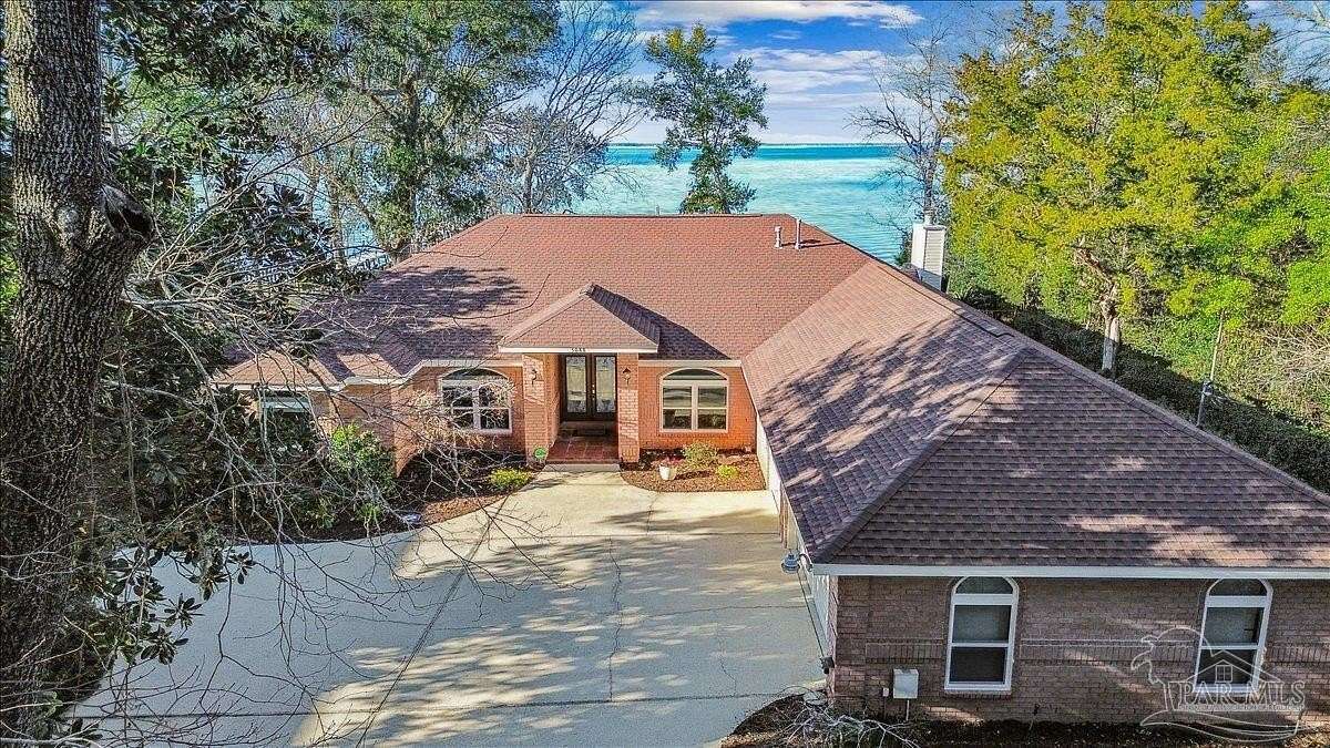 1.67 Acres of Residential Land with Home for Sale in Gulf Breeze, Florida