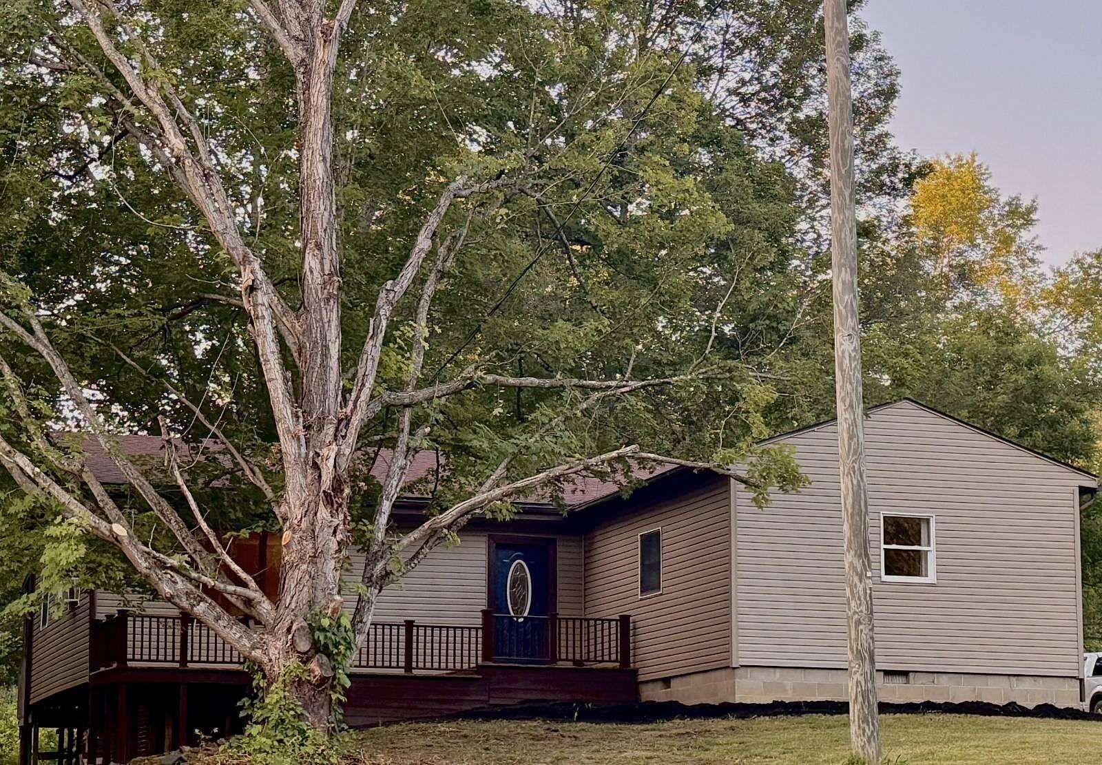 6.25 Acres of Residential Land with Home for Sale in New Plymouth, Ohio