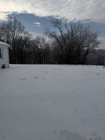 2 Acres of Residential Land with Home for Sale in Adams, Tennessee