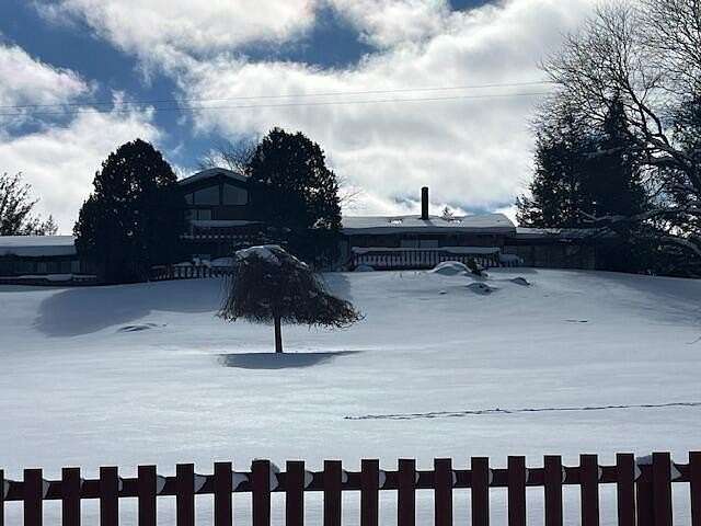 20 Acres of Land with Home for Sale in Bear Lake, Michigan