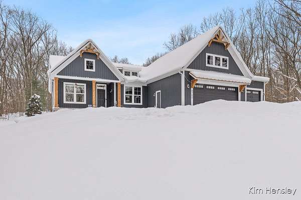 2 Acres of Residential Land with Home for Sale in Rockford, Michigan