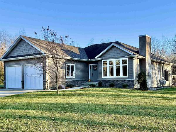 4 Acres of Residential Land with Home for Sale in Syracuse, Indiana