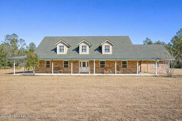 10.3 Acres of Recreational Land with Home for Sale in Glen St. Mary, Florida