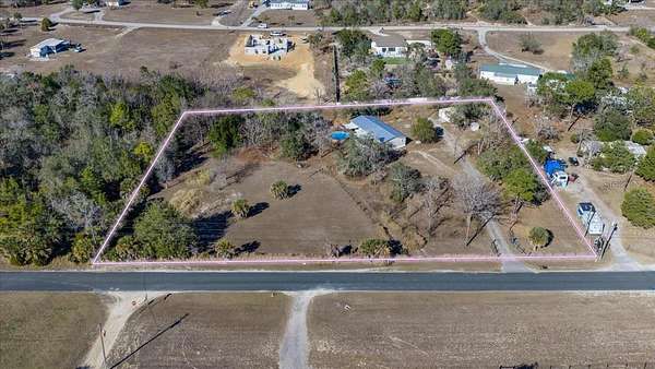 2.3 Acres of Residential Land with Home for Sale in Brooksville, Florida