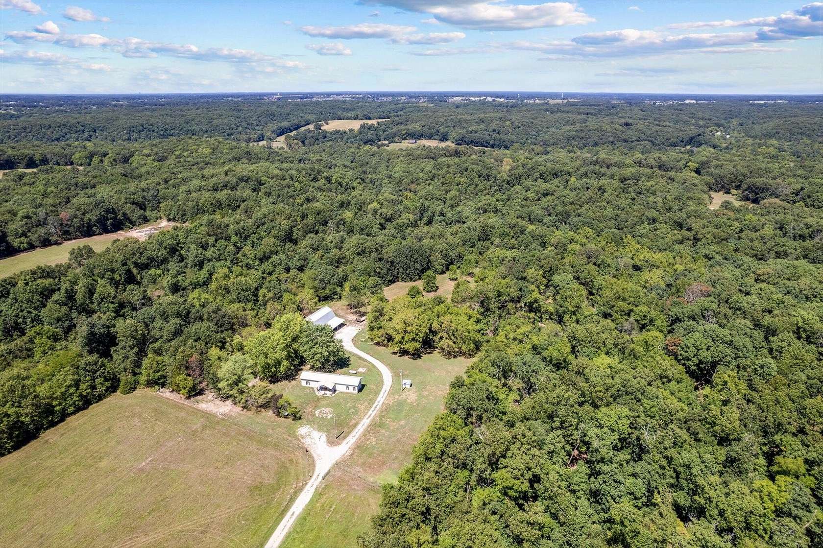 23 Acres of Land with Home for Sale in Rogersville, Missouri