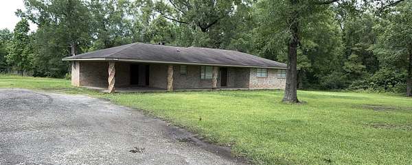 2 Acres of Residential Land with Home for Lease in Evadale, Texas