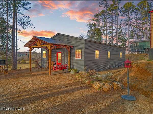 5 Acres of Residential Land with Home for Sale in Riceville, Tennessee