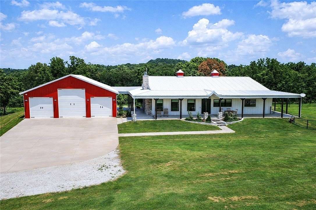 36.9 Acres of Recreational Land with Home for Sale in Gravette, Arkansas
