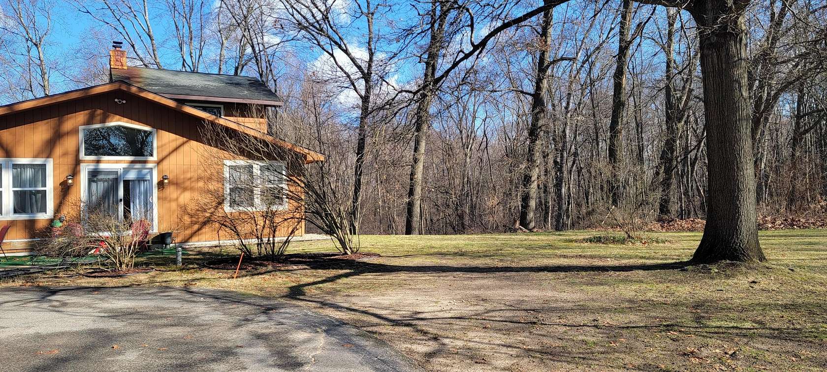 10.4 Acres of Land with Home for Sale in Portage, Michigan