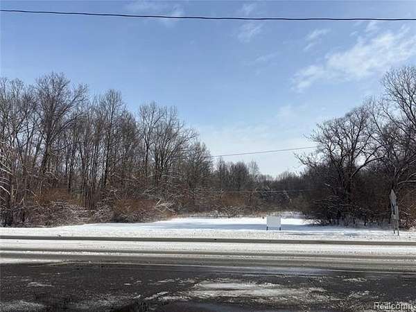 0.58 Acres of Commercial Land for Sale in Romulus, Michigan