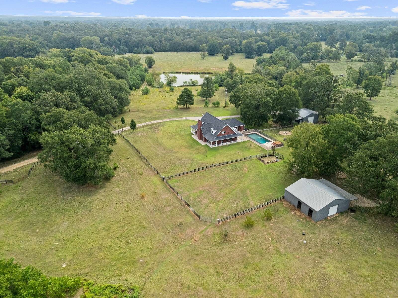 61.8 Acres of Land with Home for Sale in Timpson, Texas