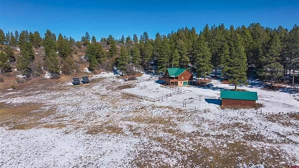 10 Acres of Land with Home for Sale in Pagosa Springs, Colorado