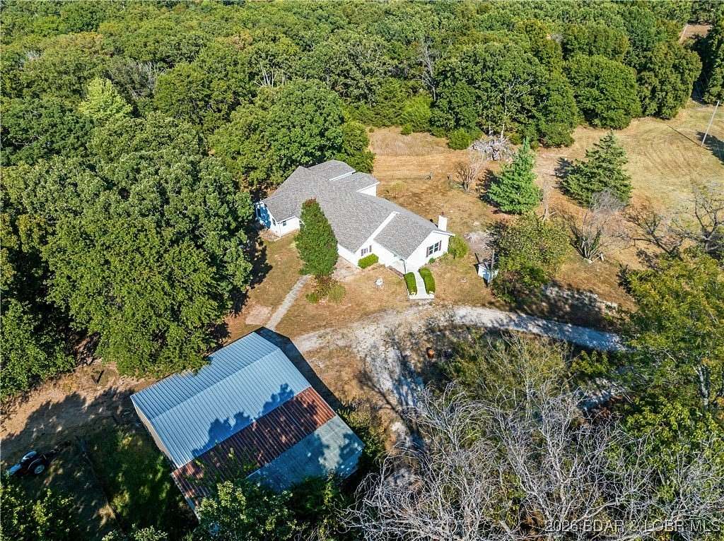 20.8 Acres of Agricultural Land with Home for Sale in Montreal, Missouri