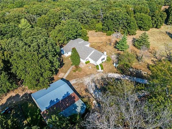 20.8 Acres of Agricultural Land with Home for Sale in Montreal, Missouri