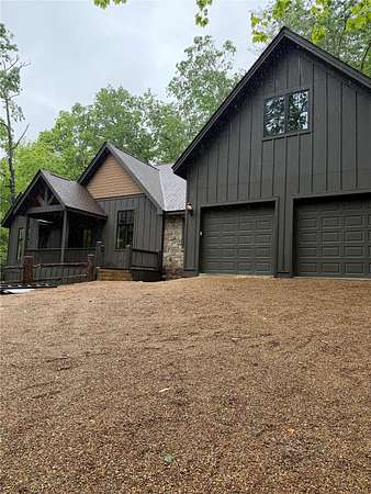 3.74 Acres of Land with Home for Sale in Cashiers, North Carolina