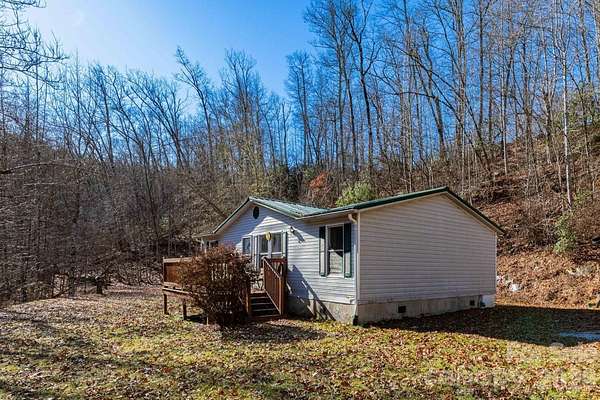 2 Acres of Residential Land with Home for Sale in Balsam Grove, North Carolina