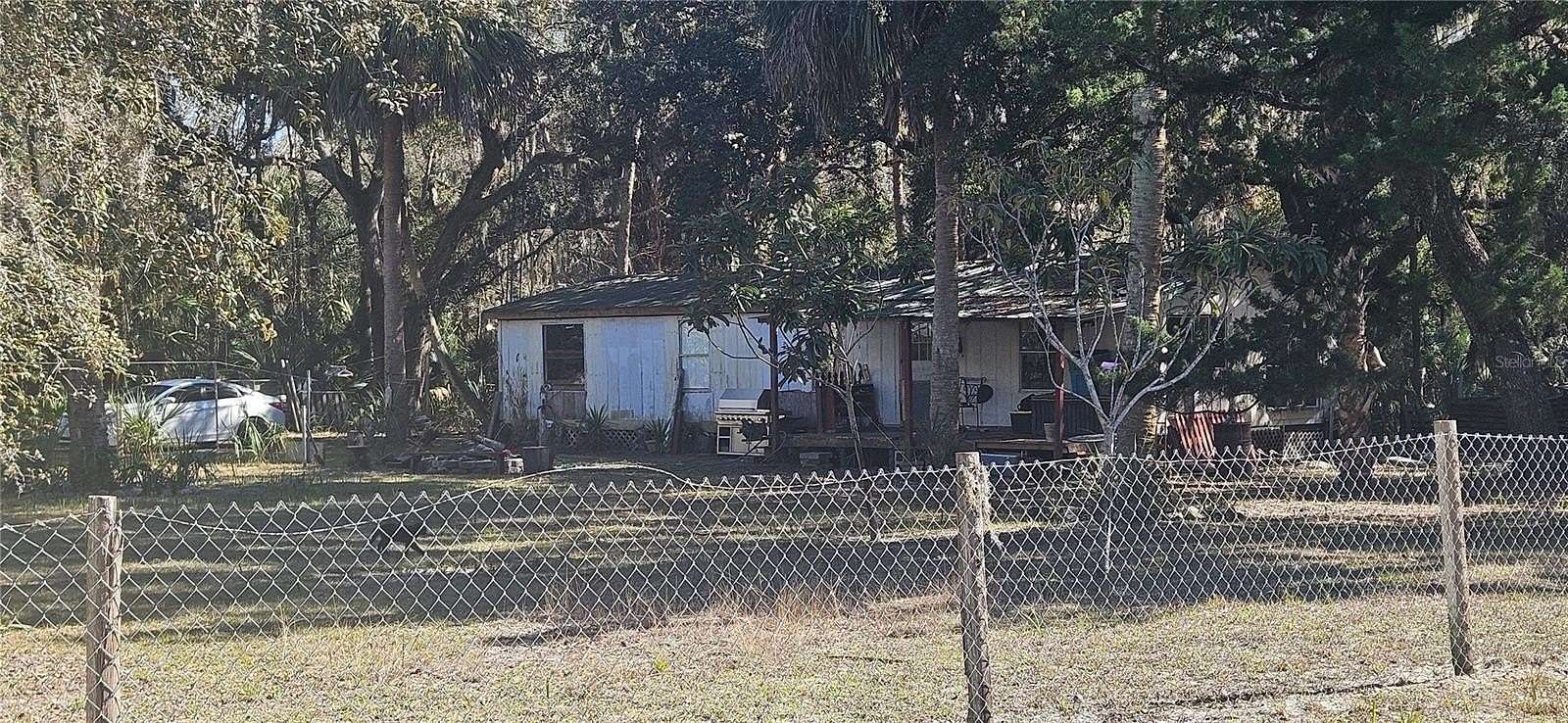 2 Acres of Land with Home for Sale in Inglis, Florida