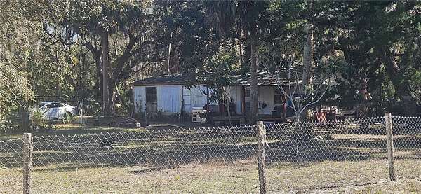 2 Acres of Land with Home for Sale in Inglis, Florida
