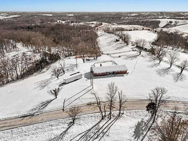 34.2 Acres of Land with Home for Sale in Foster, Kentucky