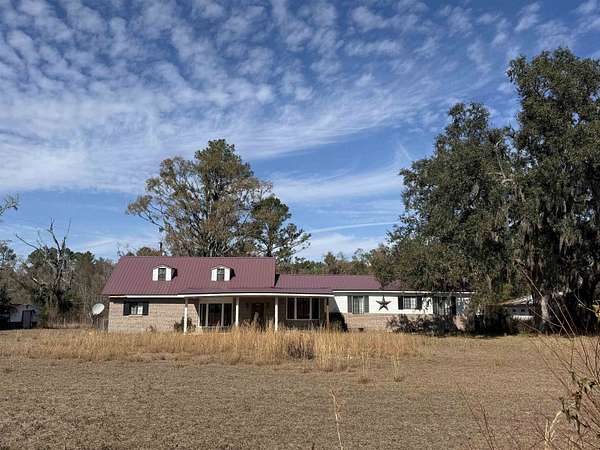 20.6 Acres of Agricultural Land with Home for Sale in Perry, Florida