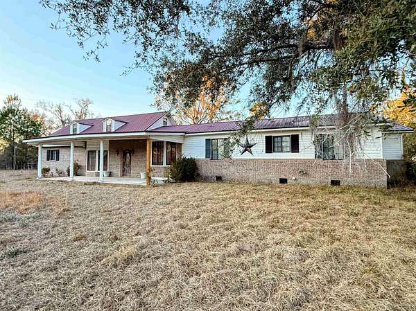 20.6 Acres of Agricultural Land with Home for Sale in Perry, Florida