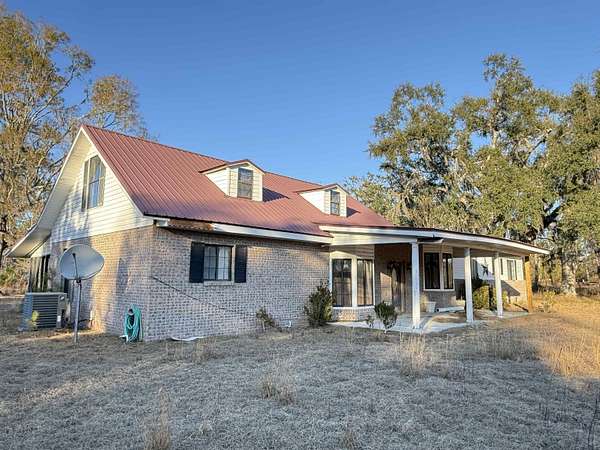 20.6 Acres of Agricultural Land with Home for Sale in Perry, Florida