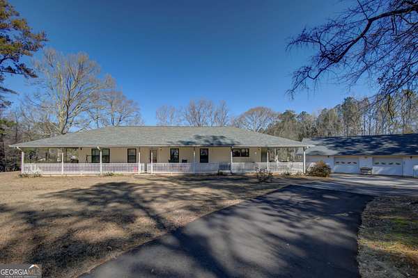 6 Acres of Land with Home for Sale in Tyrone, Georgia