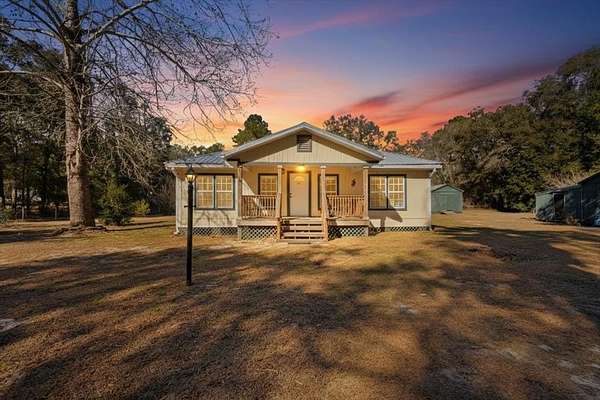 1.9 Acres of Residential Land with Home for Sale in Chiefland, Florida