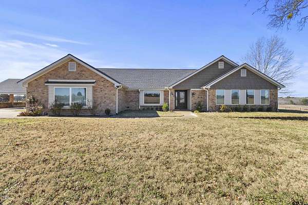 29.3 Acres of Agricultural Land with Home for Sale in Henderson, Texas