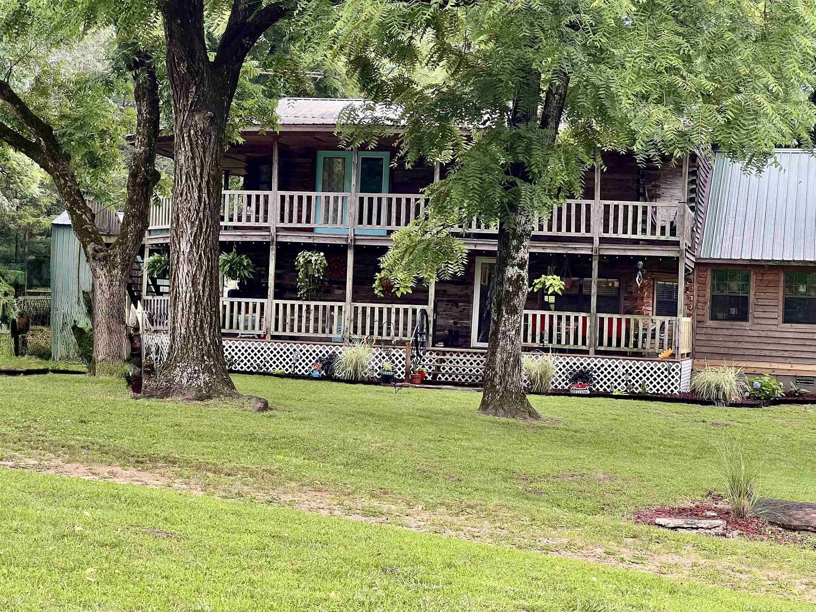 10 Acres of Land with Home for Sale in Clarksville, Arkansas