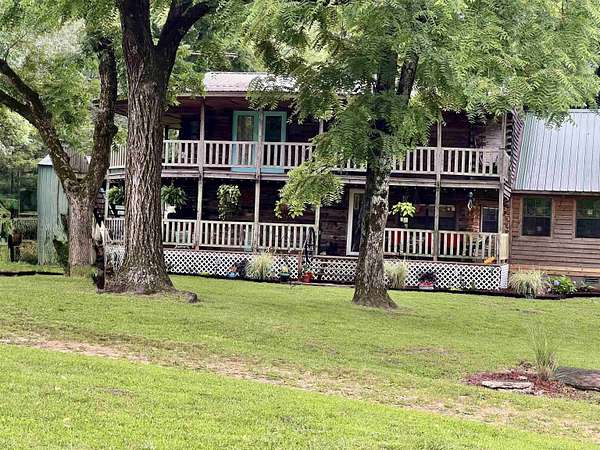 10 Acres of Land with Home for Sale in Clarksville, Arkansas