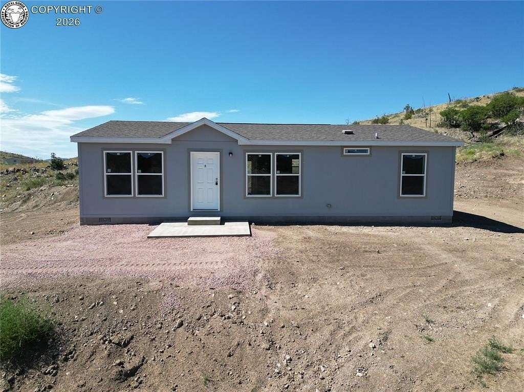 5 Acres of Residential Land with Home for Sale in Cotopaxi, Colorado