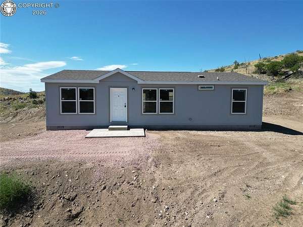 5 Acres of Residential Land with Home for Sale in Cotopaxi, Colorado