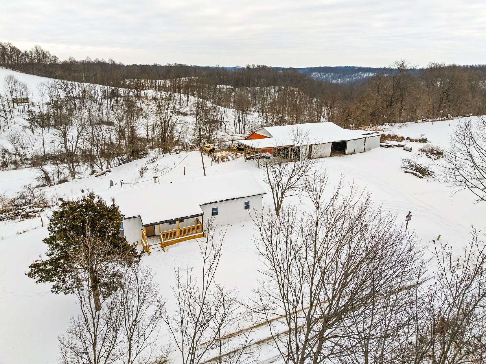 3 Acres of Land with Home for Sale in Blue Rock, Ohio