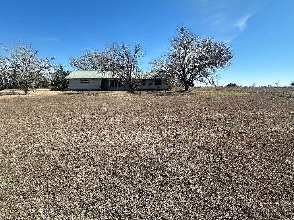 5.52 Acres of Land with Home for Sale in Schulenburg, Texas