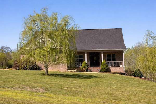 10.7 Acres of Land with Home for Sale in Rogersville, Alabama