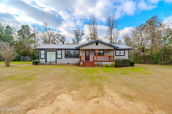 21.3 Acres of Land with Home for Sale in Marianna, Florida