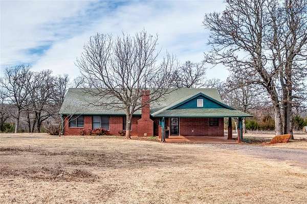 70.1 Acres of Land with Home for Sale in Carney, Oklahoma