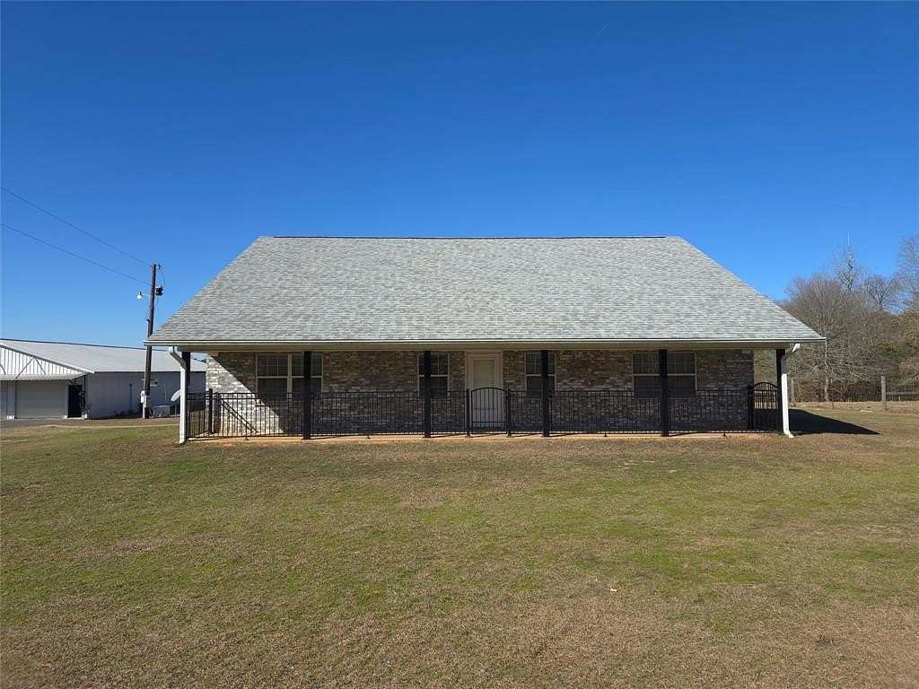 61.4 Acres of Agricultural Land with Home for Sale in Joaquin, Texas